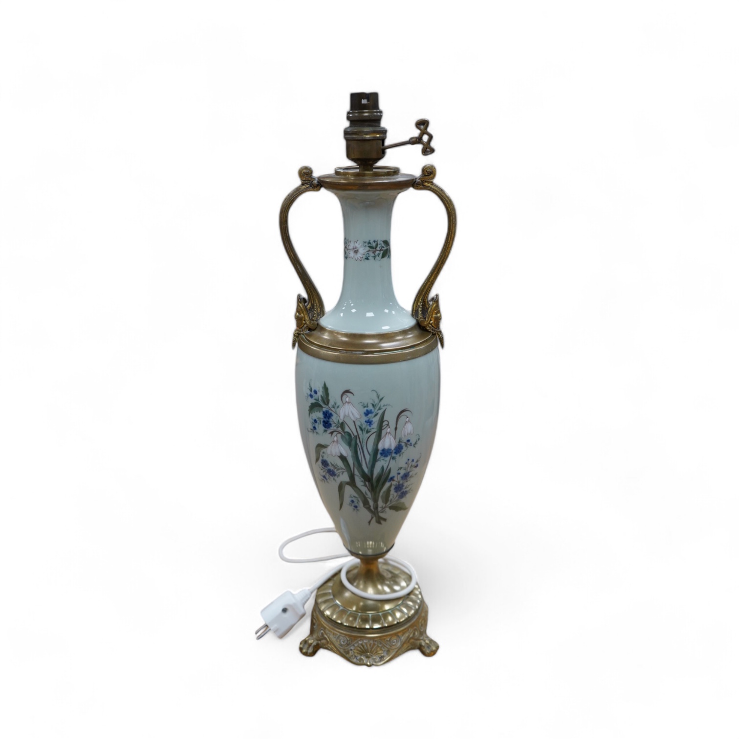 A late 19th century French celadon green glazed lamp, painted with flowers, fitted as a lamp, 56cm high overall. Condition - good